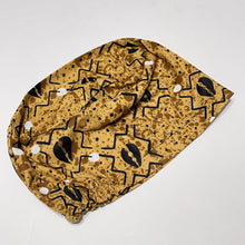 Load image into Gallery viewer, Niceroy Surgical SCRUB CAP black cowries on Tan tribal fabric Europe style nursing caps African print fabric and satin lining option.