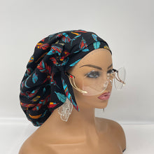 Load image into Gallery viewer, Adjustable Ankara PONY SCRUB CAP, feathers cotton fabric surgical scrub hat nursing caps and satin lining option for locs /Long Hair