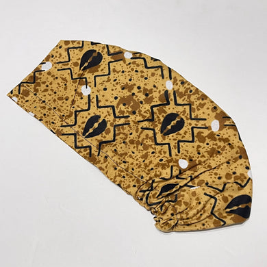 Niceroy Surgical SCRUB CAP black cowries on Tan tribal fabric Europe style nursing caps African print fabric and satin lining option.