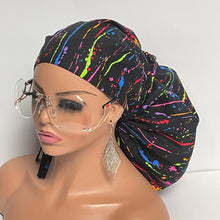 Load image into Gallery viewer, Satin lined 2XL JUMBO PONY Scrub Cap Black paint splatter cotton fabric surgical nursing hat and for Extra long/thick Hair/Locs