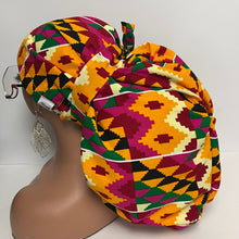 Load image into Gallery viewer, 2XL JUMBO PONY SCRUB Cap, Multicolored Kente Tribal cotton fabric surgical nursing hat for Extra long/thick Hair/Locs