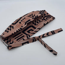 Load image into Gallery viewer, Tan and black unisex pixie Men surgical SCRUB HAT CAP, nursing caps, tie back cap, satin lining option African print men scrub cap