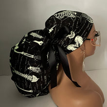 Load image into Gallery viewer, 2XL JUMBO PONY SCRUB Cap, Black white glow in the dark skeleton cotton fabric surgical hat satin for Extra long/thick Hair/Locs