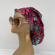 Load image into Gallery viewer, Ponytail Ankara PONY SCRUB CAP, blue, pink black Ankara cotton fabric surgical scrub hat, pony nursing caps for locs, braid, long hair