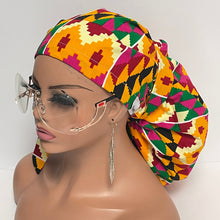 Load image into Gallery viewer, 2XL JUMBO PONY SCRUB Cap, Multicolored Kente Tribal cotton fabric surgical nursing hat for Extra long/thick Hair/Locs