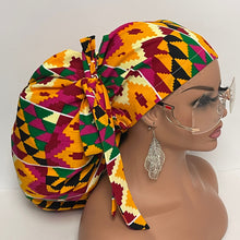 Load image into Gallery viewer, 2XL JUMBO PONY SCRUB Cap, Multicolored Kente Tribal cotton fabric surgical nursing hat for Extra long/thick Hair/Locs