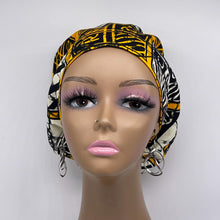 Load image into Gallery viewer, Niceroy Surgical SCRUB CAP cream yellow black Ankara Europe style nursing caps African print fabric and satin lining option.