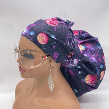 Load image into Gallery viewer, 2XL JUMBO PONY SCRUB Cap, purple solar system fabric surgical nursing hat satin lining option for Extra long/thick Hair/Loc