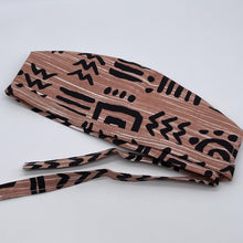 Load image into Gallery viewer, Tan and black unisex pixie Men surgical SCRUB HAT CAP, nursing caps, tie back cap, satin lining option African print men scrub cap