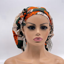 Load image into Gallery viewer, Ponytail SCRUB CAP off orange green floral cotton fabric surgical scrub hat nursing caps, satin lining option for long hair