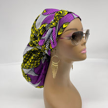 Load image into Gallery viewer, Ponytail PONY SCRUB CAP, purple and yellow Ankara cotton fabric surgical scrub hat nursing caps, satin lining option for locs/Long Hair