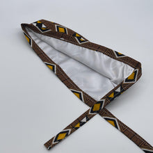 Load image into Gallery viewer, Brown yellow white unisex pixie Men surgical SCRUB HAT CAP, nursing caps, tie back cap, satin lining option African print men scrub cap