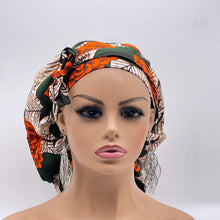 Load image into Gallery viewer, Ponytail SCRUB CAP off orange green floral cotton fabric surgical scrub hat nursing caps, satin lining option for long hair