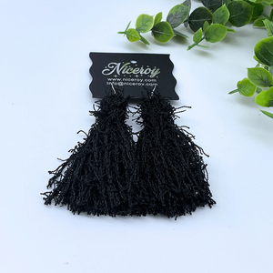 Black medium size tassel fringe earrings