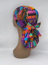 Load image into Gallery viewer, Ponytail Ankara PONY SCRUB CAP, Kente cotton fabric surgical scrub hat pony nursing caps and satin lining option for locs /Long Hair