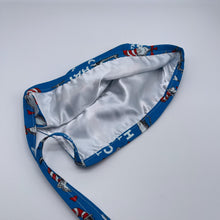 Load image into Gallery viewer, Dr. Seuss &quot;Cat in the Hat&quot; Scrub Hat: Tie Back Surgical Cap