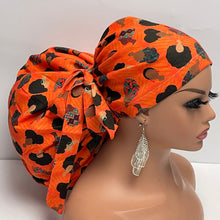 Load image into Gallery viewer, 2XL JUMBO PONY SCRUB Cap, earth orange black women fabric surgical nursing hat satin lining option for Extra long/thick Hair/Locs