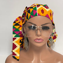 Load image into Gallery viewer, 2XL JUMBO PONY SCRUB Cap, Multicolored Kente Tribal cotton fabric surgical nursing hat for Extra long/thick Hair/Locs