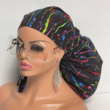 Load image into Gallery viewer, Satin lined 2XL JUMBO PONY Scrub Cap Black paint splatter cotton fabric surgical nursing hat and for Extra long/thick Hair/Locs