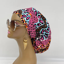 Load image into Gallery viewer, Ponytail Ankara PONY SCRUB CAP, blue, pink black Ankara cotton fabric surgical scrub hat, pony nursing caps for locs, braid, long hair