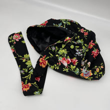 Load image into Gallery viewer, Ponytail All New Flattery Back Pony Hair Cover scrub Hat for long Hair, Braids,Locs. Black Floral cotton print fabric