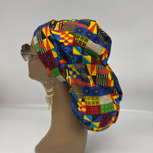 Load image into Gallery viewer, Ponytail All New Flattery Back Pony Hair Cover scrub Hat for long Hair, Braids, Locs. Ankara cotton African print fabric with satin lining