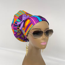 Load image into Gallery viewer, Adjustable JUMBO PONY SCRUB Cap, pink purple Kente cotton fabric surgical nursing hat and satin lining option for Extra long/thick Hair/Locs