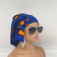 Load image into Gallery viewer, Adjustable Ankara PONY SCRUB CAP, cotton fabric surgical scrub hat Royal blue and Orange satin lining option for locs, braid, long hair