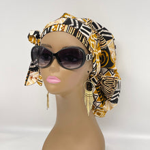 Load image into Gallery viewer, Adjustable PONY SCRUB CAP, black,white and tan Ankara cotton fabric surgical scrub hat nursing caps, satin lining option for locs /Long Hair
