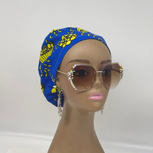 Load image into Gallery viewer, Niceroy surgical SCRUB HAT CAP,  Ankara Europe style nursing caps royal blue and Yellow African print fabric and satin lining option.